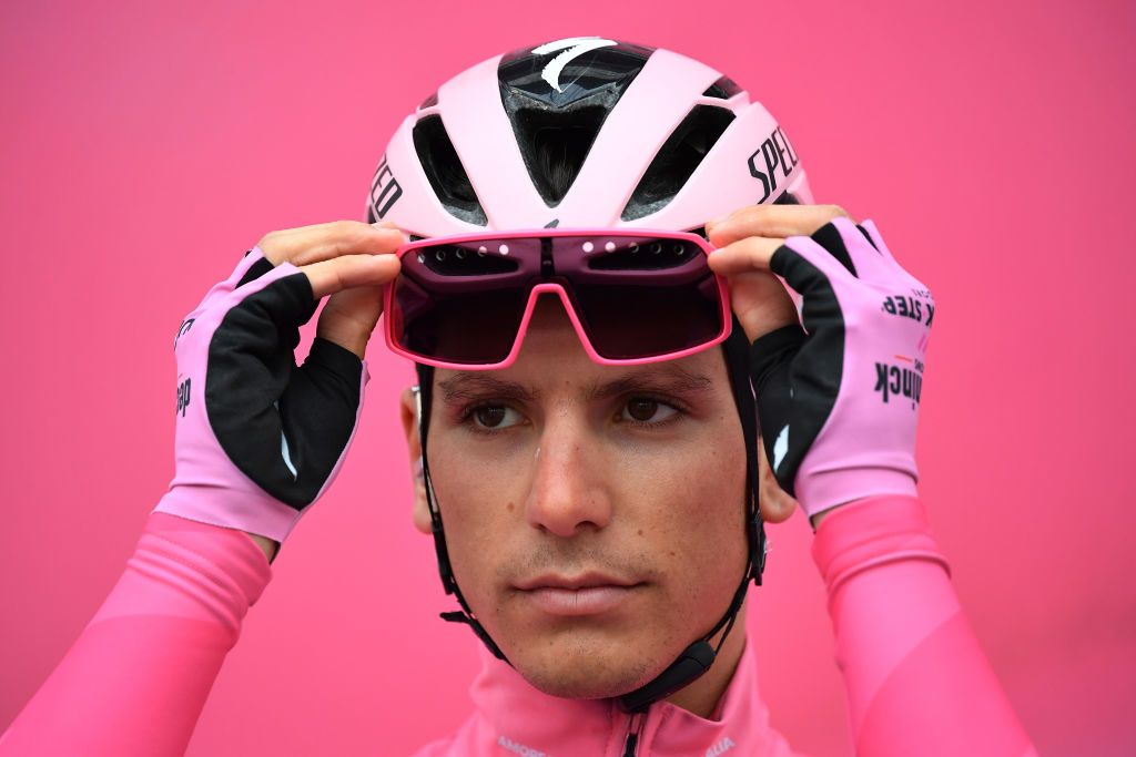 LAGHI DI CANCANO ITALY OCTOBER 22 Start Joao Almeida of Portugal and Team Deceuninck QuickStep Pink Leader Jersey Piazza San Giacomo Pinzolo City Team Presentation Landscape during the 103rd Giro dItalia 2020 Stage 18 a 207km stage from Pinzolo to Laghi di Cancano Parco Nazionale dello Stelvio 1945m girodiitalia Giro on October 22 2020 in Laghi di Cancano Italy Photo by Stuart FranklinGetty Images