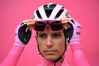 LAGHI DI CANCANO ITALY OCTOBER 22 Start Joao Almeida of Portugal and Team Deceuninck QuickStep Pink Leader Jersey Piazza San Giacomo Pinzolo City Team Presentation Landscape during the 103rd Giro dItalia 2020 Stage 18 a 207km stage from Pinzolo to Laghi di Cancano Parco Nazionale dello Stelvio 1945m girodiitalia Giro on October 22 2020 in Laghi di Cancano Italy Photo by Stuart FranklinGetty Images