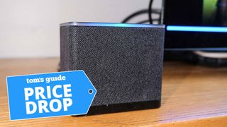 A photo of the Amazon Fire TV Cube (2022) on a desk