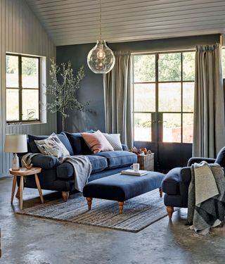 Blue sofa and chair in Scandi style living room