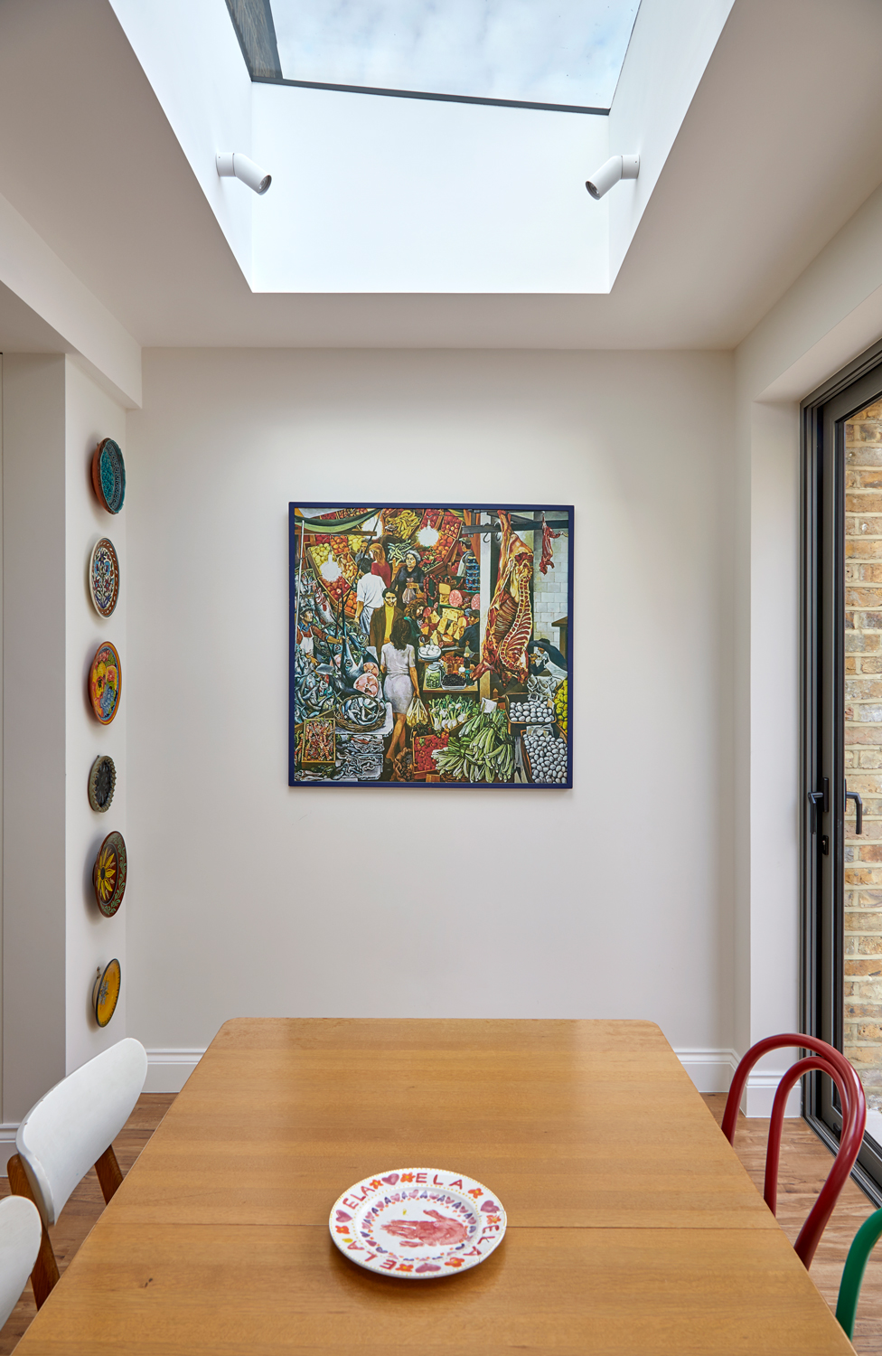 interior of West London extension Ealing return, a colourful modern kitchen addition