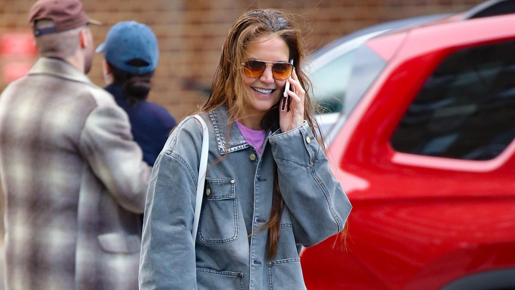 Katie Holmes wears red trousers