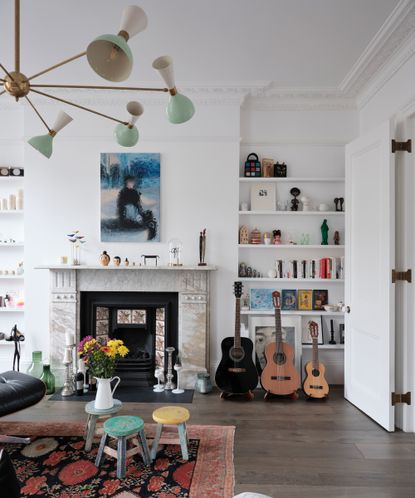 White living room with alcove shelving