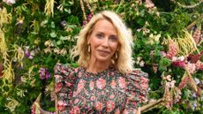 Laura Hamilton wears a Aspiga London dress and a Holland Cooper bag to attend the RHS Chelsea Flower Show 2026 at The Royal Hospital Chelsea on May 18, 2026 in London, England.