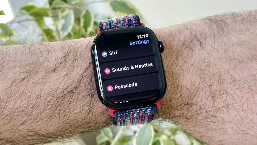 Close-up of a user&#039;s wrist wearing the Apple Watch Series 10 running the latest watchOS 26 software. The screen shows the new Automatic Audio Adjustments setting