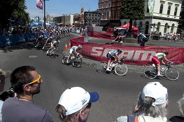 Riders wheel around the roundabout at the end of the home straight in Williamstown.
