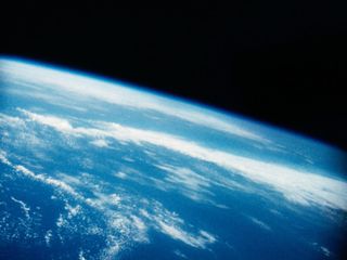 Scientists think that clouds could exacerbate warming global termperatures. In this image you can see astronaut Alan B. Shepard, Jr.'s view of Earth that no American had seen before, looking down on the home planet from his history-making suborbital flight on May 5, 1961. 