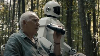 Frank Langella in the woods with Robot in Robot & Frank