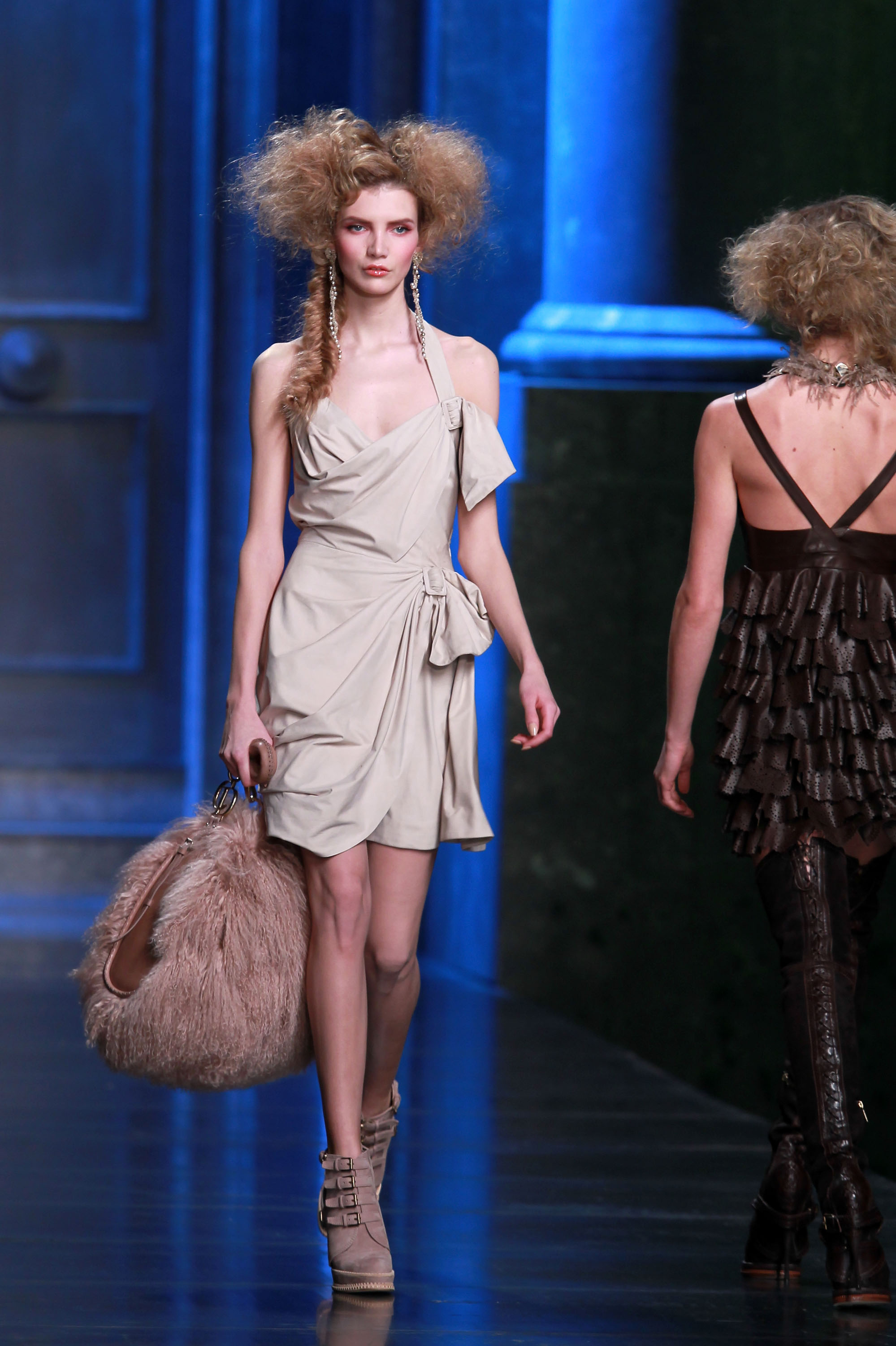 A model carried Jennifer Lopez's gym bag down the Dior Fall 2011 runway