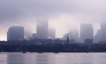 The city Boston covered by fog in early spring.