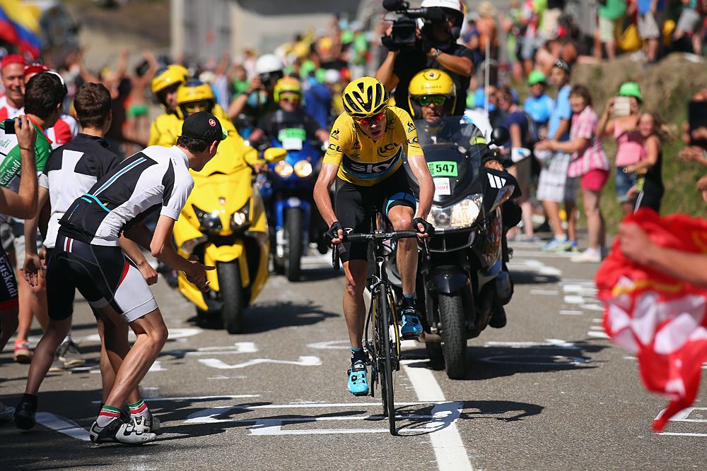 Chris Froome (Team Sky) rides toward the finish line as the stage 10 winner