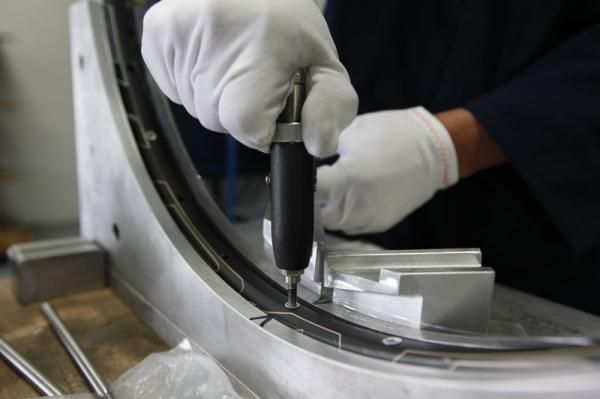Threaded inserts are hand-installed into each Haven Carbon rim.