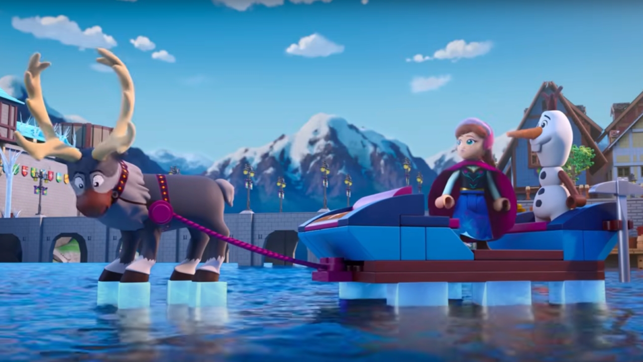 Anna and Olaf on a sled in the water pulled by Sven in LEGO Disney Frozen: Operation Puffins