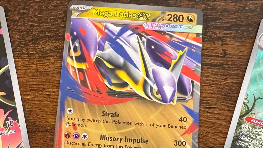 A Mega Latias ex card on a wooden surface, beside two other cards