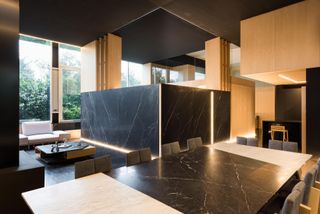 Mexico City apartment interior with marble dividing walls