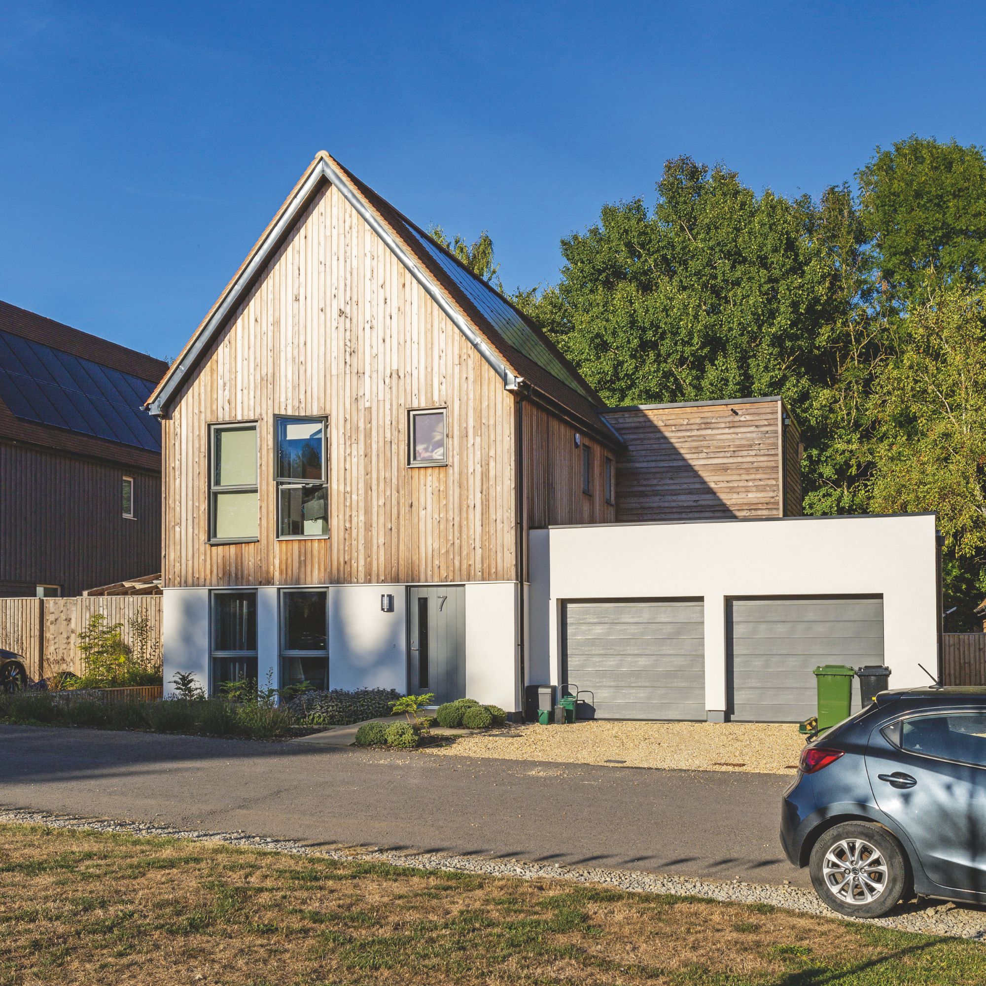 Exterior of a house with a car on the driveway