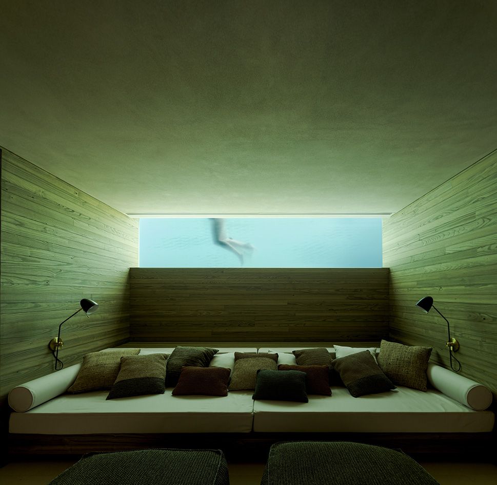 Casa Boa Vista cinema room with peek into swimming pool