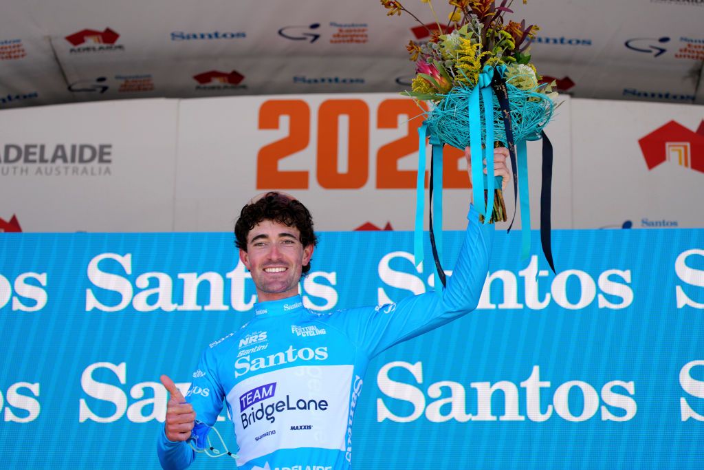 LOBETHAL AUSTRALIA JANUARY 27 James Whelan of Australia and Team Bridgelane celebrates at podium winning the blue leader jersey during the 2nd Santos Festival Of Cycling 2022 Mens Elite Stage 1 a 1142km stage from Stirling to Lobethal TourDownUnder on January 27 2022 in Lobethal Australia Photo by Daniel KaliszGetty Images