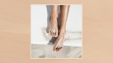 Image of a bird's eye view of a woman's feet on the sand, in a cream frame set against a warm beige watercolour-style background 