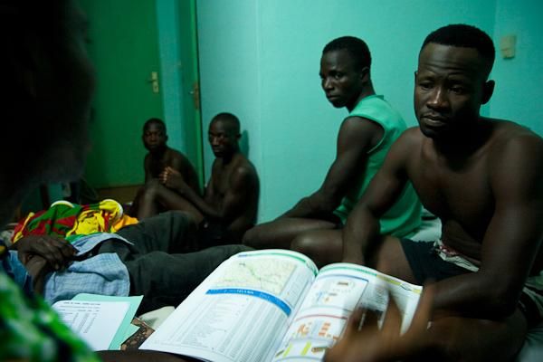 After a challenging Stage 1, Coach Gandaho discusses the game plan with the Benin National Team.