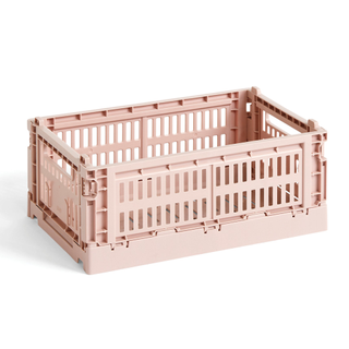 A pastel pink recycled plastic storage crate