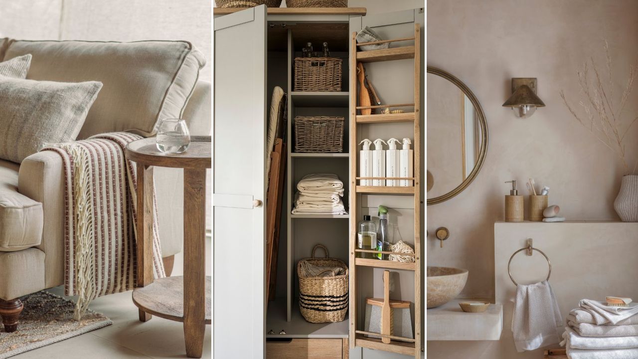 A cream linen couch with a round wooden side table beside it with a glass of water on it, a folded cream blanket draped over the arm / An open cabinet with cleaning supplies stored inside / A clean stone shelf in a bathroom 