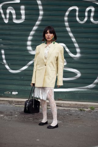 women wearing butter yellow at milan fashion week