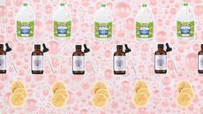 Pink bubbly background with cut outs of lemons, white vinegar and essential oil