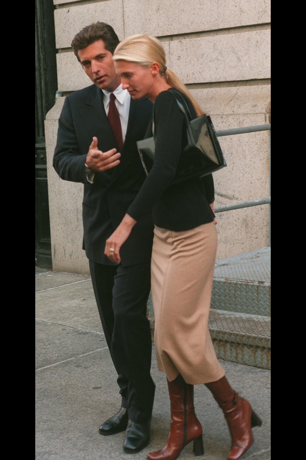 Carolyn Bessette-Kennedy wore patent leather black Prada bags on repeat in the '90s