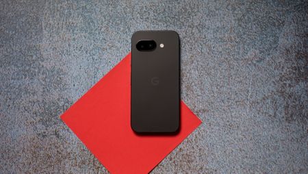 Google Pixel 9a back on a red background
