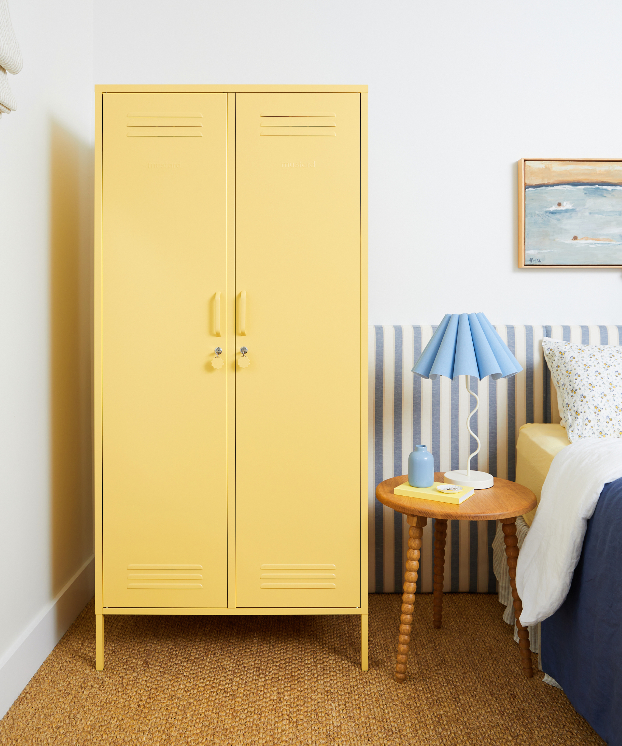 yellow locker wardrobe in bedroom with coir flooring