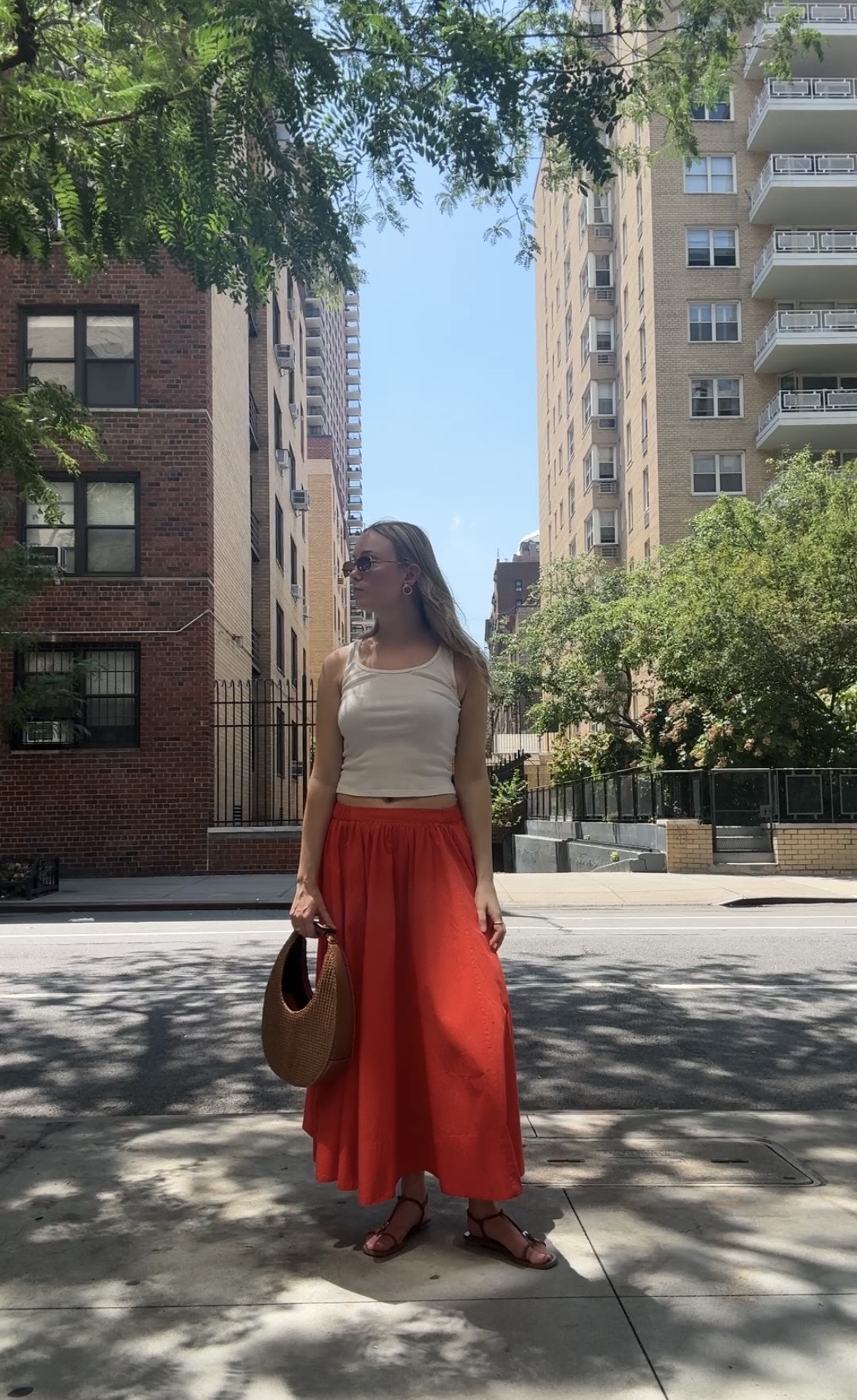 Fashion Director Michaela Bushkin wearing the Lowen Midi Skirt.