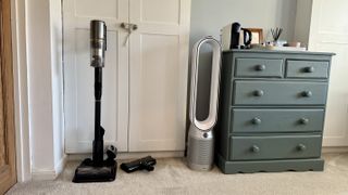 Dreame V20 Pro vacuum on its stand in a room corner