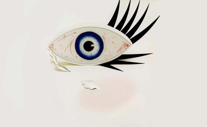 A teary, red eye constructed from different materials