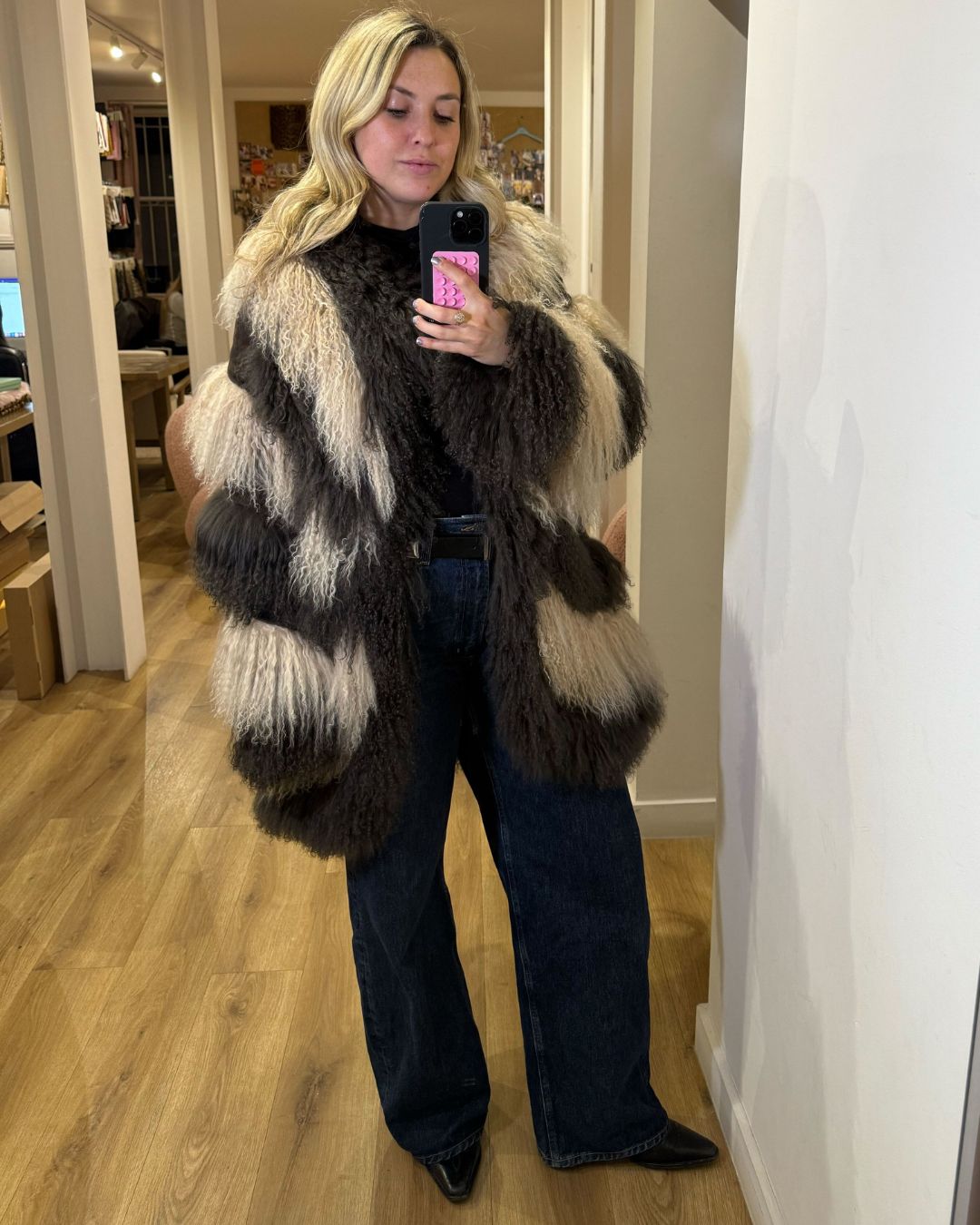 clementina jackson wearing a charlotte simone mongolian shearling coat