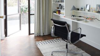 home office with chair and open window