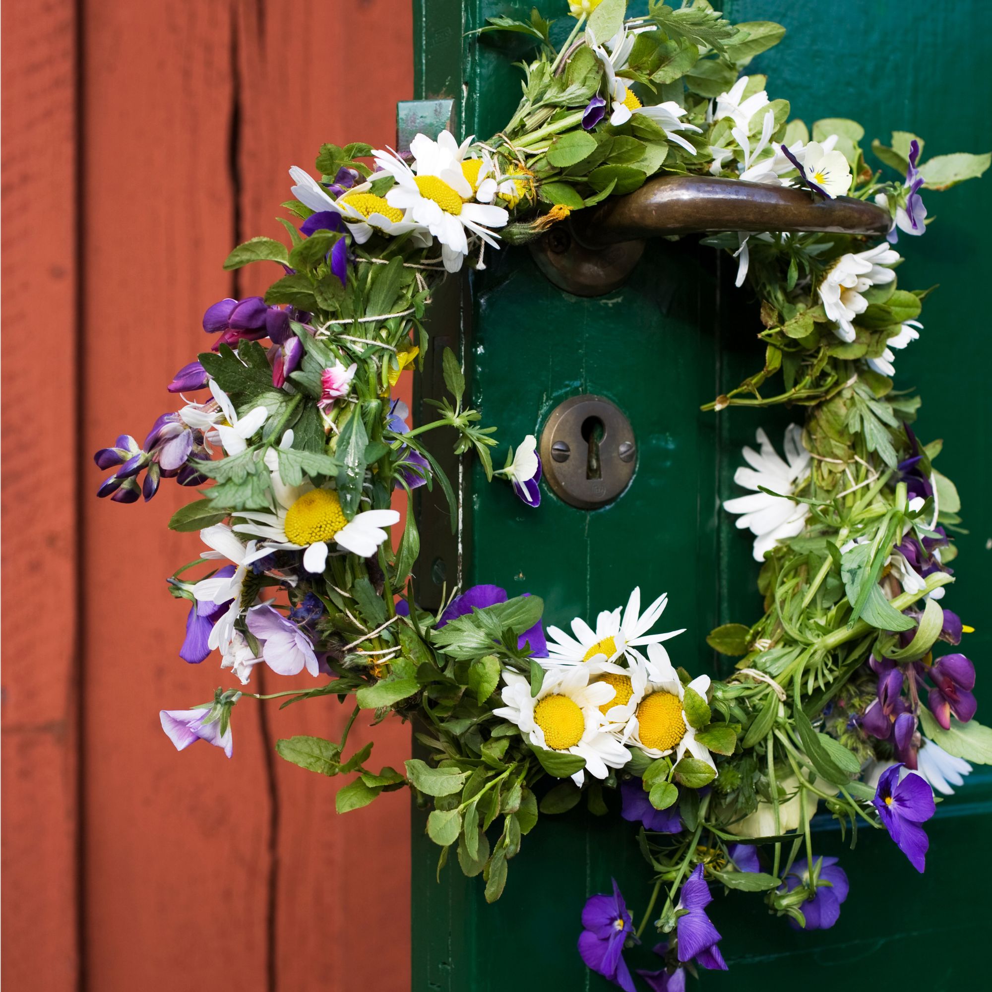 Flower wreath hanging on door