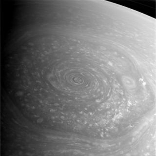 Saturn's mysterious northern vortex, a vast hexagon-shaped storm, dominates this photo taken Nov. 27, 2012, by NASA's Cassini spacecraft. This image is a raw and unprocessed view.