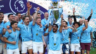 Man City celebrating their 2022/23 Premier League victory in Together: Treble Winners
