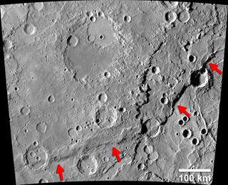 The Enterprise Rupes on Mercury (identified by arrows) is the largest lobate fault scarp on Mercury. It is 621 miles long (1,000 kilometers) and rises 1.8 miles (3 km) above the Rembrandt basin, one of the largest impact craters on Mercury.