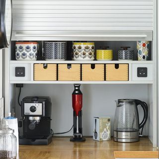 kitchen with coffee machine and kettle