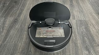 The dust box of the Dreame Bot L10 Pro is located under a flap on the top of the robot vacuum