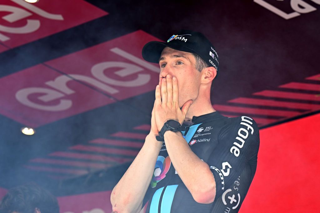 CAORLE ITALY MAY 24 Alberto Dainese of Italy and Team DSM celebrates at podium as stage winner during the the 106th Giro dItalia 2023 Stage 17 a 197km stage from Pergine Valsugana to Caorle UCIWT on May 24 2023 in Caorle Italy Photo by Stuart FranklinGetty Images