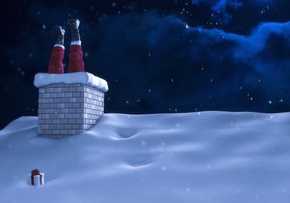 Santa Claus stuck in a chimney on a roof on Christmas night with snowfall.