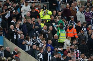 Medical personal were called to assist a fan in the stands during the Premier League match between Newcastle and Tottenham