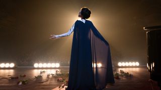 Angelina Jolie poses on stage as Maria Callas in Netflix's "Maria"