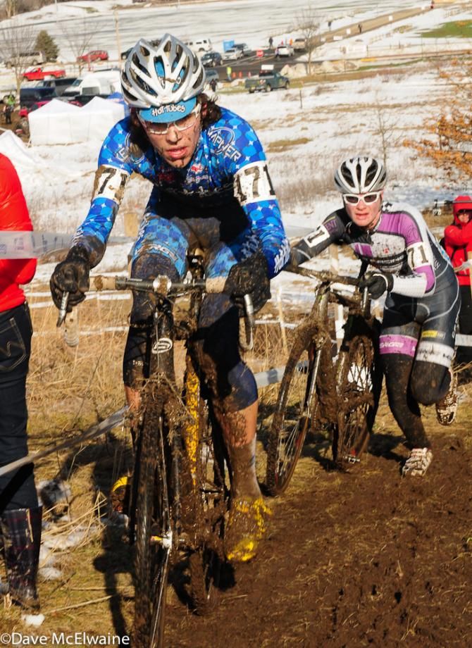 Curtis White (Hot Tubes) leading Goguen on lap two up one of the climbs
