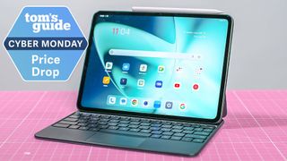 A OnePlus Pad tablet on a table with a Tom's Guide Cyber Monday deals badge