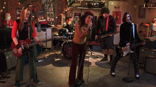 Pink Slip performing in a garage in Freaky Friday