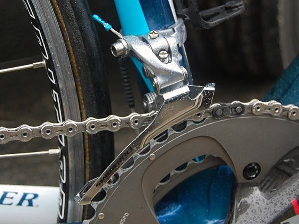 SRAM 'Red' front derailleurs with retrofitted stiffer steel cages are becoming a common sight in the pro peloton.